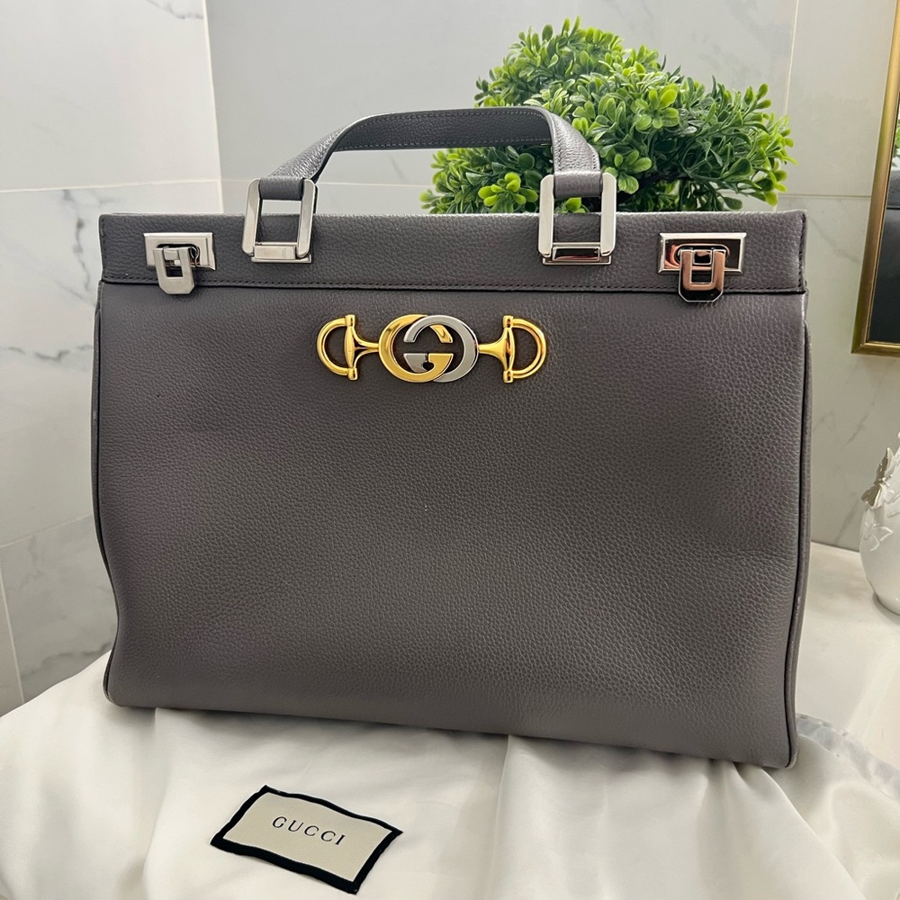 SOLD❌❌❌Gucci Gray Tote with Gold and silver Accents